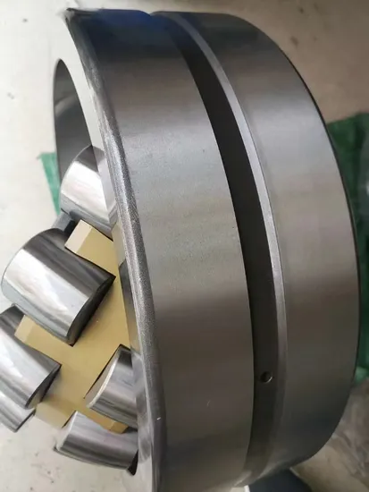 High Precision Spherical Roller Bearings 22211/22212/22213 CA/CC/CAK/CCK offer superior load capacity, misalignment tolerance, and long service life for heavy-duty industrial applications.